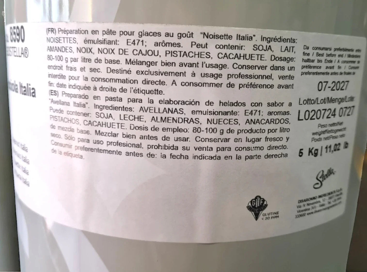 Etichetta su confezione da 5 kg di pasta di nocciola per gelato artigianale, ingredienti e istruzioni visibili.